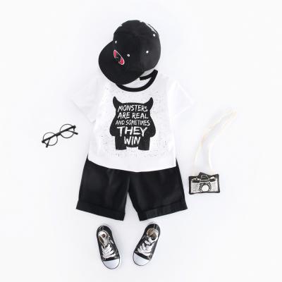 China 8 Year Boy Summer Black And White Shirt 100cm Short Sleeved Little Monster for sale