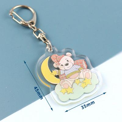 China Animation Products Etc Manufacturer custom bear cheap clear print blank acrylic charm cartoon logo anime keychains for sale