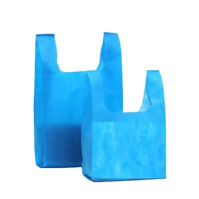 China Fashion Handled Reusable Eco-friendly Customized Cheap Non Plastic W Cut Nonwoven Supermarket Vest Shopping Bag for sale