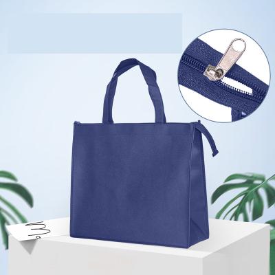 China Wholesale Handled Tote Non Woven Bag With Zipper Shopping Bag Promotional Reusable Bag for sale