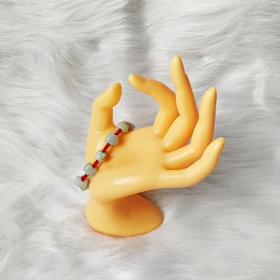 China Wholesale Realistic Ring Bracelet Jewelry Display Stand Plastic Mannequin Hand For Jewelry for sale