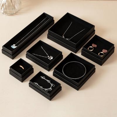 China Jewerly Packaging Exquisite Necklace Storage Box Rings Bracelet Gift Case Black Wrapping Paper Cardboard Portable Jewelry Box for sale