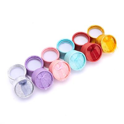 China Cheap Colorful Round Jewelry Ring Box Cardboard Bowknot Wedding Ring Stud Earrings Packaging Case Factory Wholesale Jewerly Packaging for sale