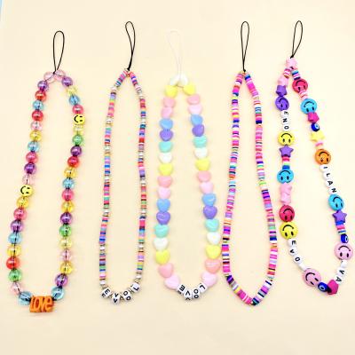 China 2021 New Fashion Central Statistical Handmade Beaded Phone Charms Tie Polymer Clay Beads Pearl Smiley Face Acrylic Star Phone Lanyard Accessory for sale