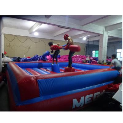 China Popular Fighting Inflatable Gladiator Party Rental Park PVC Amusement Park Interactive Sports Game for sale