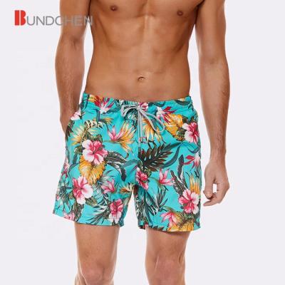 China Breathable Fashion Quick Drying Floral Custom Design Blue Color Trunks Men Beach Pants Swimwear for sale