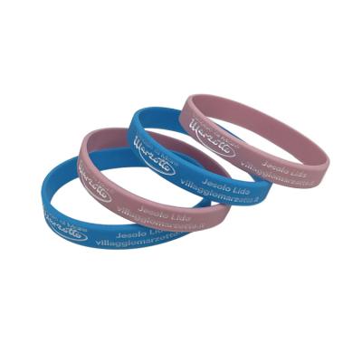 China Eco-friendly China made souvenir silicone wristband debossed silicone wristband with ink filled logo for sale