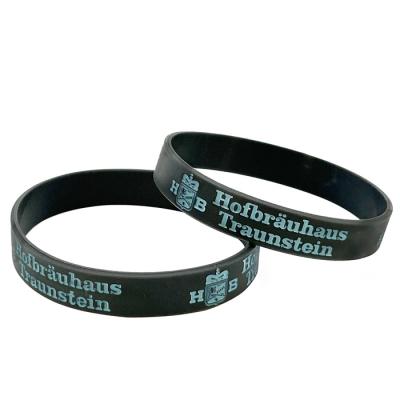 China Cheapest factory price eco-friendly silicon wristband debossed black silicon wristband with ink filled logo for sale