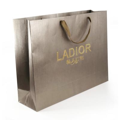 China Recyclable Embossing Specialty Paper Gold Stamping Paper Bag Printing Paper Bag For Gift for sale