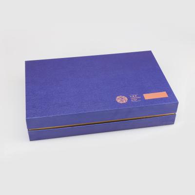 China Handmade Blue Printing Gold Foil Stamping Plastic Inner Gift Packaging Box For Tea for sale