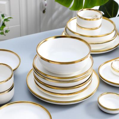 China Viable Hot Selling Luxury Porcelain Gold Round Dinnerware Plates Color Luster Marble Dinnerware Sets for sale