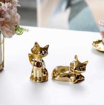 China Simple and beautiful minimalistic gold ceramic home decoration ornaments subtract mini small fox crafts for sale