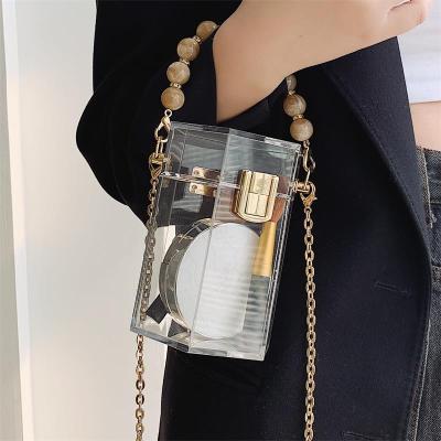 China 100% Eco-friendly Acrylic Handbag Clears Bags Wholesale Hexagon Chain Purse Cylinder Women Evening Clutches for sale