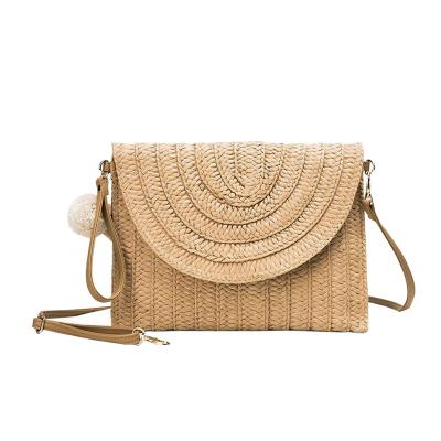 China 100% New Types Eco-friendly Handmade Straw Clutch Bag Wholesale Small Square Woven Shoulder Beach Pillow Bag for sale