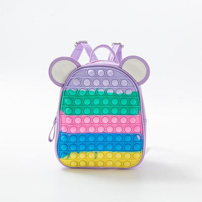 China Cute new fashion kids rainbow bear ear sensory stress reliever push bubble silicone schoolbag for kids for sale