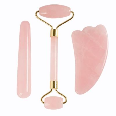 China Face Massager New Arrival Cosmetics Jade Roller Skin Massage Roller Pink Mounted Quartz Face Roller for sale