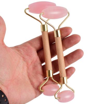 China Natural Rose Quartz Jade Roller Beauty 100% Jade Stone Facial Massager Custom Logo Amethyst Rose No Label Rose Face Massager Stand for sale