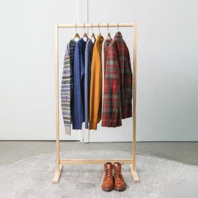 China Minimalist Bamboo Wooden Clothes Show Rack Cloths Hanging Rack Shelf for sale