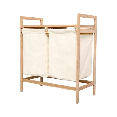 China Removeable Bags Bamboo Laundry Hamper Sorter With Double Compartments Two Piece Laundry Hamper With Removable Sliding Bags And Shelf Bathroom for sale