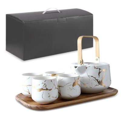 China Sustainable Tea Set with White Marble Design Ceramic Pot (40 Ounces) 4 Piece Ceramic Wood Serving Tray (8 Ounces) Tea Cups, Luxury Tea Set for sale