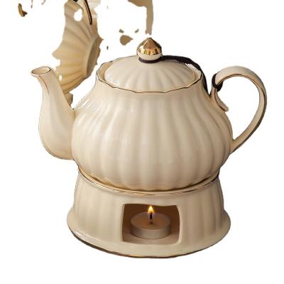 China Viable British Handle Ceramic Glass Teapot With Candle Warmer Base Set European Afternoon Tea Set Pot Coffee Porcelain Home Decoration for sale