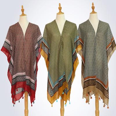 China New Style Fashion Squishy Geometric Pattern Printed Soft Polyester Women Customized Designer Striped Tassels Poncho Shawl for sale