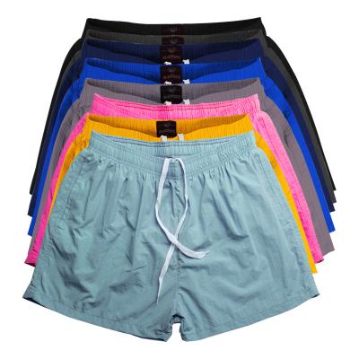 China Hot Sale Solid Color Quick-drying Breathable Wholesale Men's Summer Beach Swim Shorts Seaside Swimming Trunks for sale