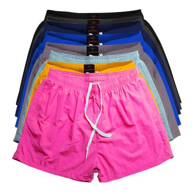 China Summer Casual Style Solid Color Hot Sale Breathable Beach Shorts Mens Nylon Board Shorts Surf Breathable Swim Trunks for sale