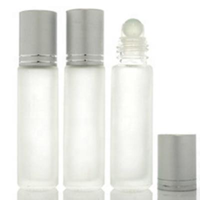 China Cosmetic ready to ship essential oil perfume10ml clear amber glass roll on bottles with plastic roller for sale