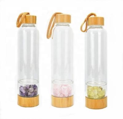 China Viable Motivation Glass Cup 500ml Crystal Gemstone Water Bottles with Bamboo Lid for Yoga for sale