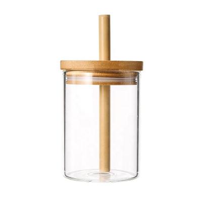 China Sustainable Unique Clear Wide Mouth Glass Water Bottle With Bamboo Lid And Straws Amazon Success for sale