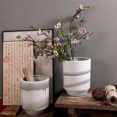 China Art Deco New Trending Home Decor Origami Vase Living Room Decorative Ceramic Vases for sale