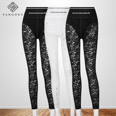 China Night Club Lady Lace High Waisted Zipper Pants QUICK DRY Black See Through Patchwork Hollow Out Peeling Pants for sale