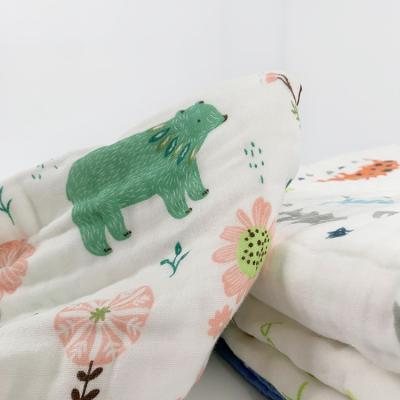 China Custom Print Child Cartoon Style Bamboo Folded Muslin Wrap Baby Wrap Bamboo Knit Throw Blanket for sale