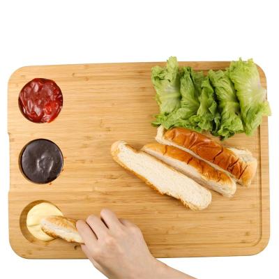 China Viable Reversible Bamboo Cutting Board with Built-In Compartments and Juice Grooves for sale