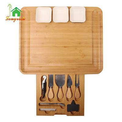 China Sustainable Kitchen Cheese Board Charcuterie Board Set Meat Fruit Platter Bamboo Wooden Serving Tray With Knife Set Drawer for sale