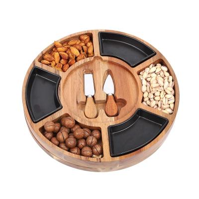 China Sustainable Eco Friendly Round Cheese Cutting Board Bamboo Wood Cutting Plate With Bowls And Cutlery Set for sale