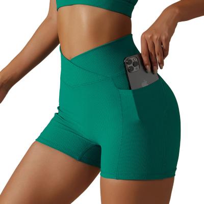 China Breathable Women Cross Waist V Workout Shorts High Waisted Yoga Gaiters Sweat Sports Booty Ribbed Biker Biker Shorts With Pockets for sale