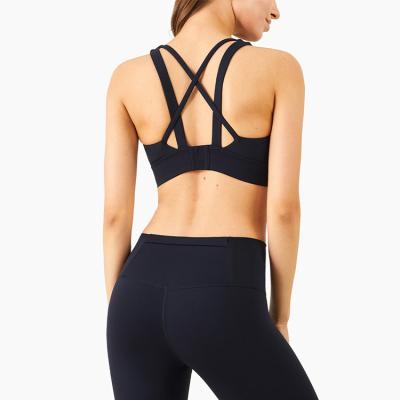 China Breathable Yoga Bra Padded Gym Workout Sports Shockproof Crop Top High Impact Fitness Cross Back Bra Fit Running Women Strappy for sale