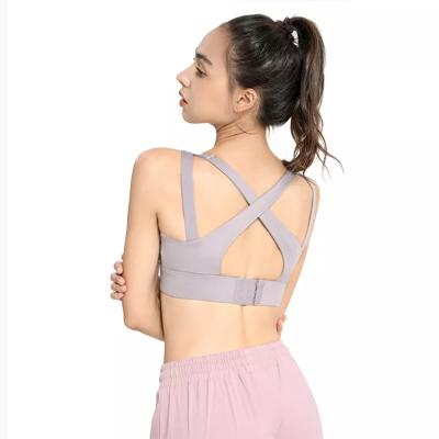 China 2022 Wholesale New Style Women Sports Bra Sports Breathable High Elastic Sexy Cross Lift Wear Fitness Yoga Bra for sale