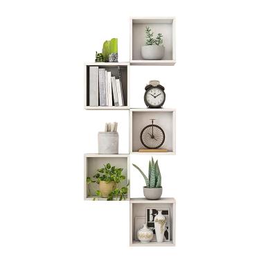 China Minimalist shelf wall shelf on the wooden wall in the living room for sale