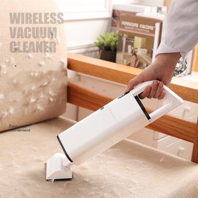 China New Vehicle Office Pet Mini Portable Hand Cordless Handy Car Sofa Bed Dog Cat Vacuum Cordless Rechargeable Handheld Rechargeable Cleaner for sale