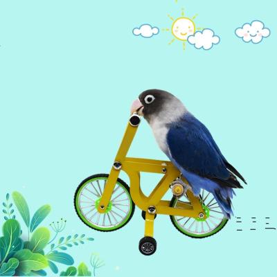 China Fashion Mini Four Wheeled Bird Toy Sustainable Pet Bird Parrot Training Mini Carts Toy for sale