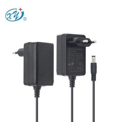 China LED light. Hot Selling Black Case EU 18W 24W 12V 1.5A 2A Strip Power Adapter For Strip Christmas Tree Lights for sale