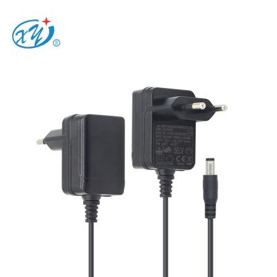 China factory outlet OEM wall mount TUV CE GS ERP EMC 12v dc adapter 12volt 1amp 1000ma power adapter for led strip light XY12LE-120100VH-EW for sale