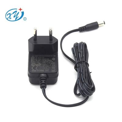 China Universal EU Power Adapter 5v 1a 2a Adapter Eu UK Change Kr Us Au Plug 6v 800ma Switching Adapter 12volts 500ma XY06J-1200500-EW for sale