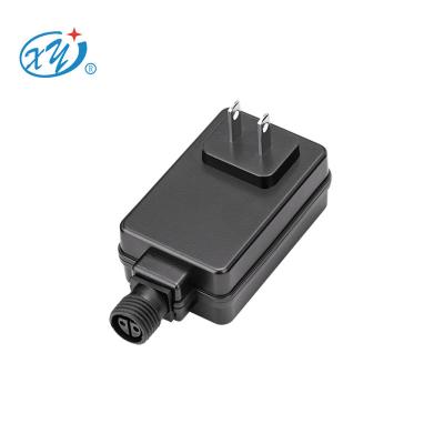 China LEDs. Hot Sale USA CCTV Plug In 12V 2A 24W IP44 AC DC Adapter Power Supply Outdoor Use for sale