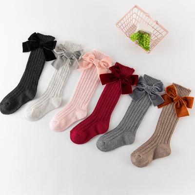 China Lovely Ribbon Bow Sustainable Knee High Baby Socks For Kids Girls for sale