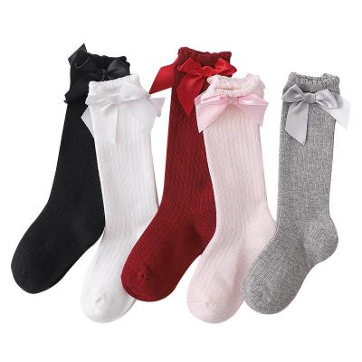 China Sustainable cute ribbon bow long socks for babies for sale