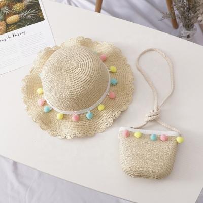 China Cute Character Kids Straw Tassels Hat And Purses Set For Kids Girls for sale